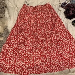 Red skirt with white flower detail